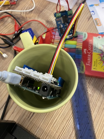 A cup with an Arduino in it