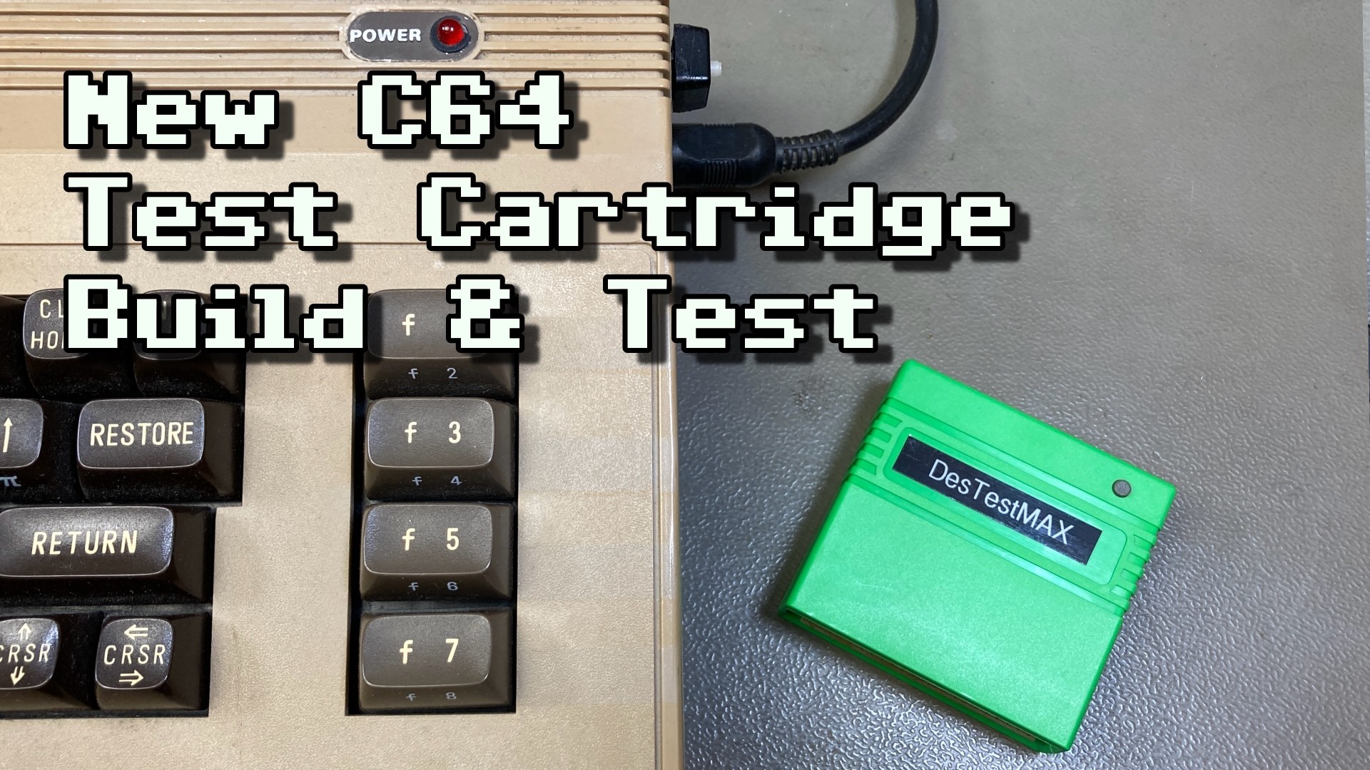 Thumbnail for my video. Showing the right side of a Commodore 64 bread bin with a bright green short cartridge next to it. The label on the cartridge reads "DesTestMAX". The overlayed text reads "New C64 Test Cartridge Build & Test". Thumbnail for my video. Showing the right side of a Commodore 64 bread bin with a bright green short cartridge next to it. The label on the cartridge reads "DesTestMAX". The overlayed text reads "New C64 Test Cartridge Build & Test".