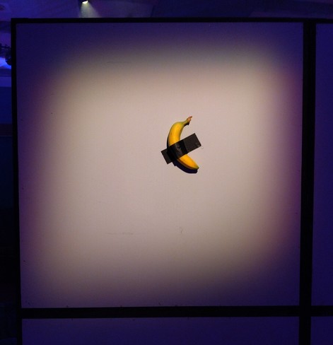 A banana glued to a wall with duct tape at the 38th chaos communication congress, Hall H, c-base habitat