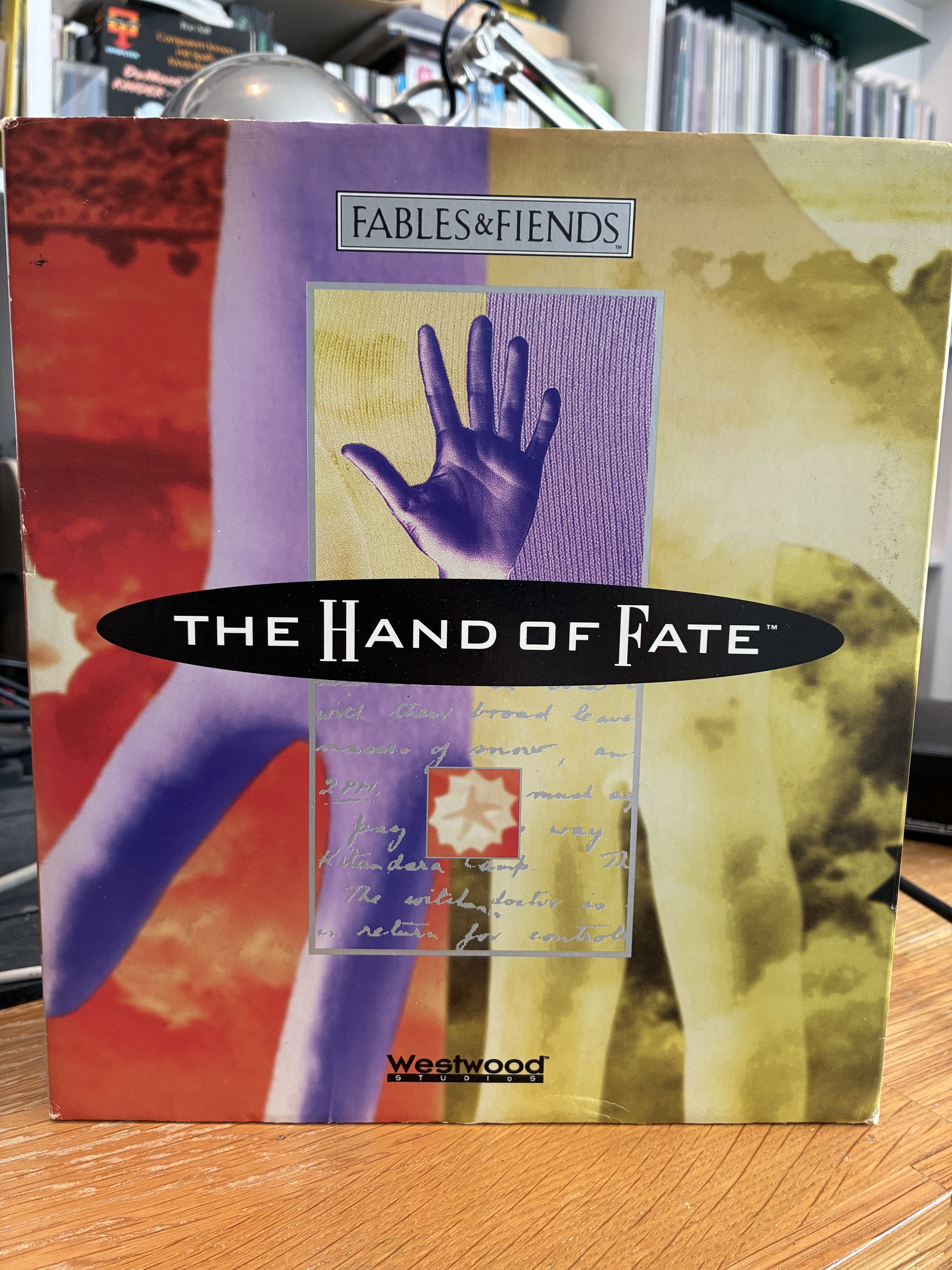 Front of the big box showing the literal hand of fate