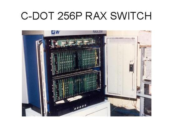 picture of a C-DOT 256P RAX cabinet with doors open shwoing circuit boards